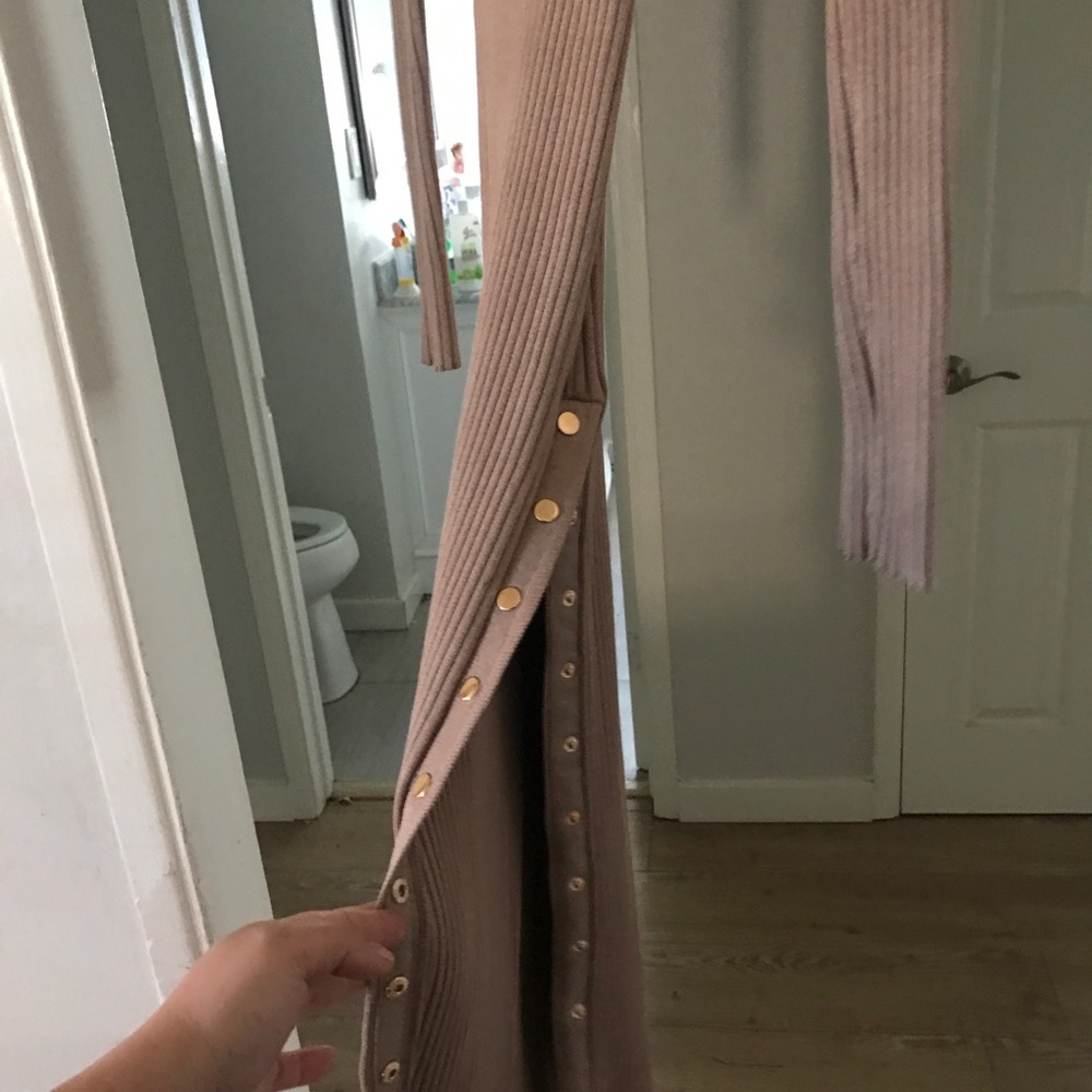 Beautiful tight fitting dress size L brand new